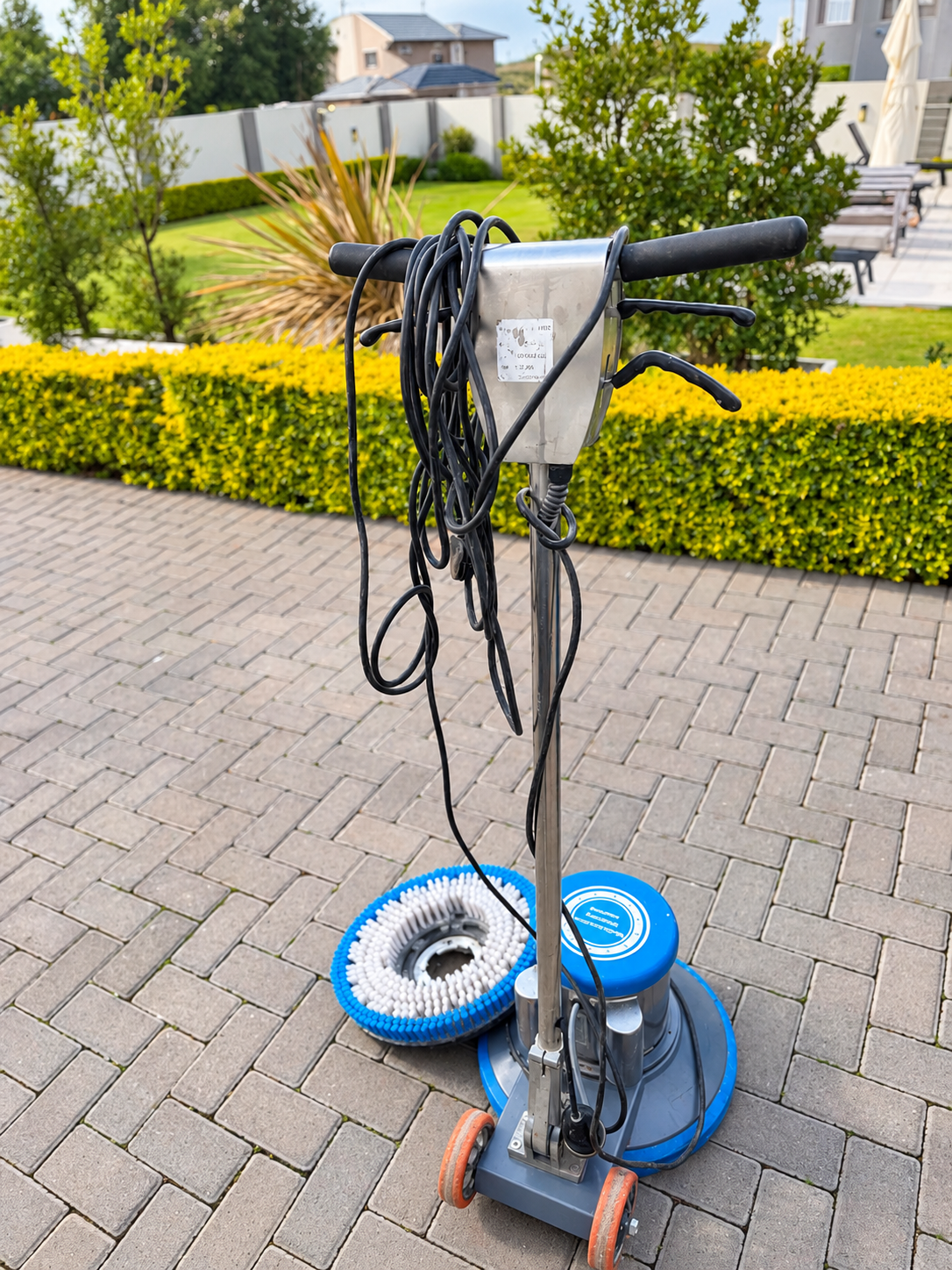 Rotary floor machine with brush and pad